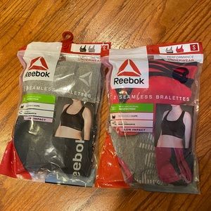 Reebok Sports Bras (2) Packs with 2 bras in each.  4 total